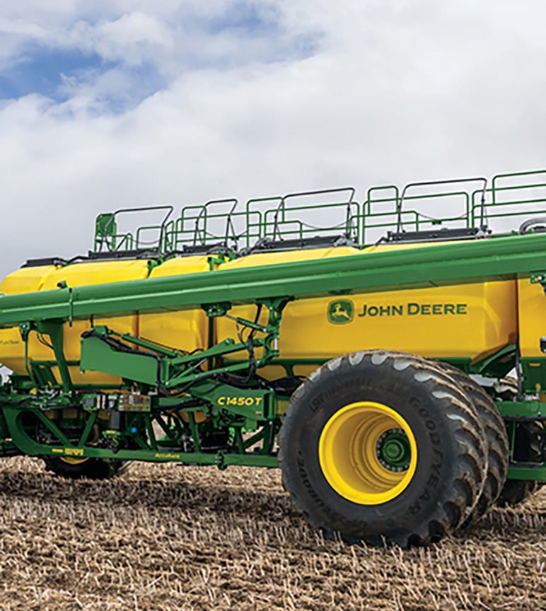 New C1450T Air Cart seeding a field