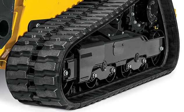 Close up view of 333G Compact Track Loader’s anti-vibration undercarriage