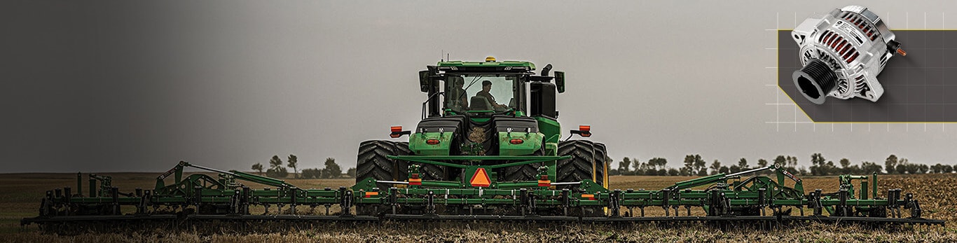 John Deere tractor pulling a wide tillage implement in a field, with a small inset image of an alternator.