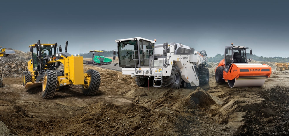 Composite image of a John Deere motor grader, dozer, and ADT as well as a Hamm roller, Wirtgen soil stabilizer and recycler, and Vögele paver.