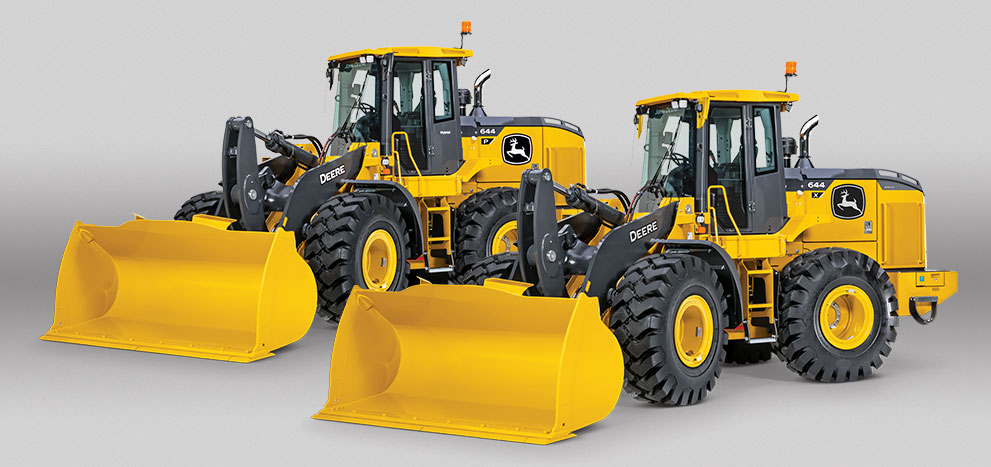 a 644 P-Tier and a 644 X-Tier mid-size wheel loader on a grey background