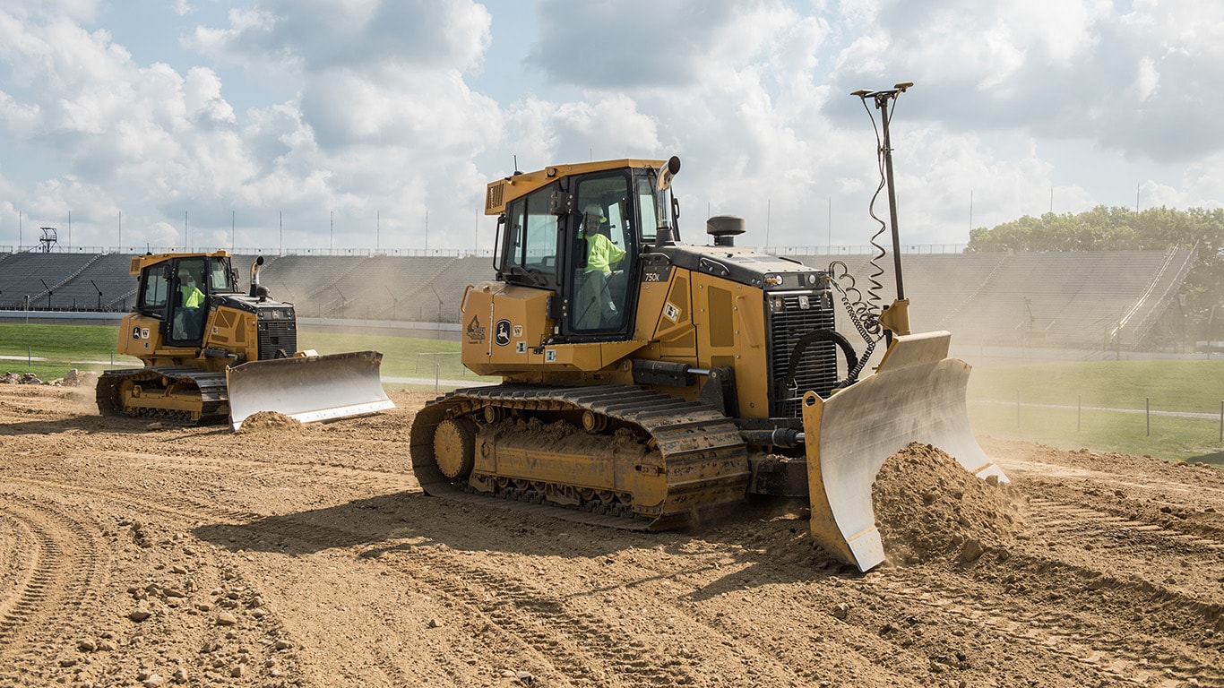 750K dozers work on a new track at the Indianapolis Speedway