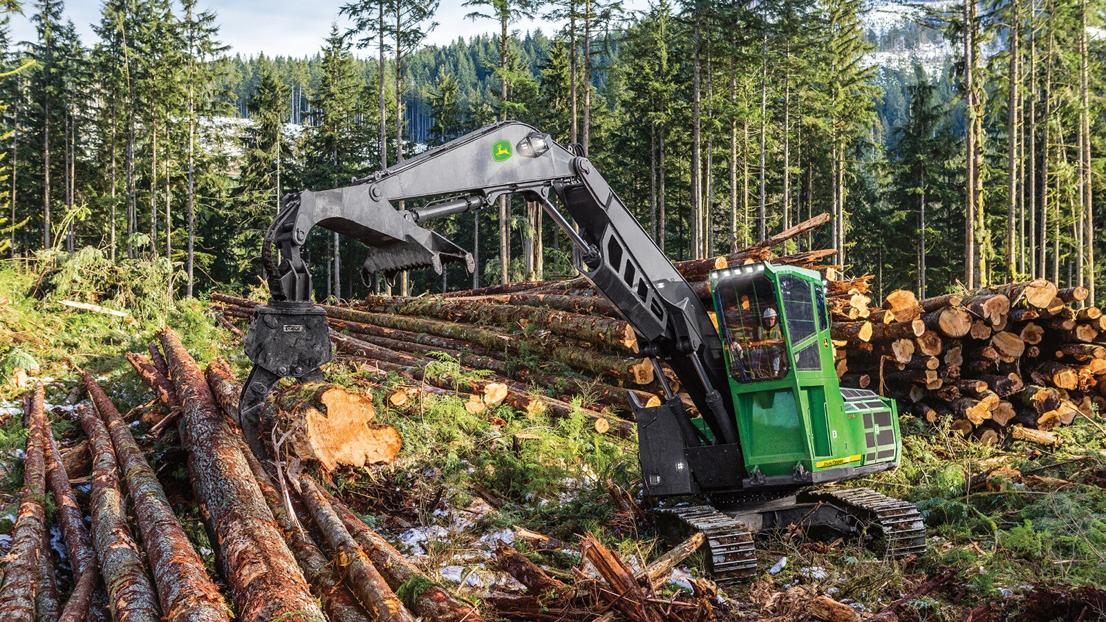 3756G Swing Machine picking up a log