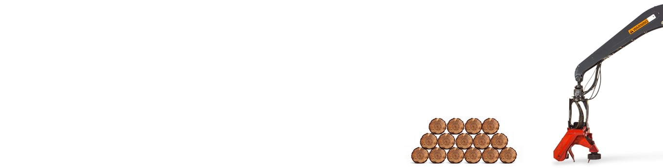 A harvester boom with Waratah harvesting head rests next to a stack of logs