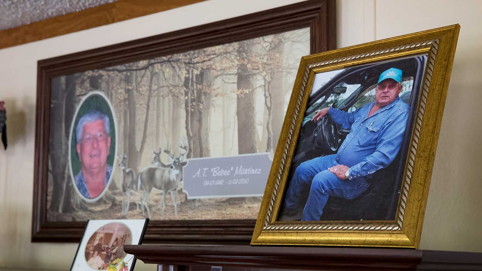 Framed photos of A.T. Martinez in the family home