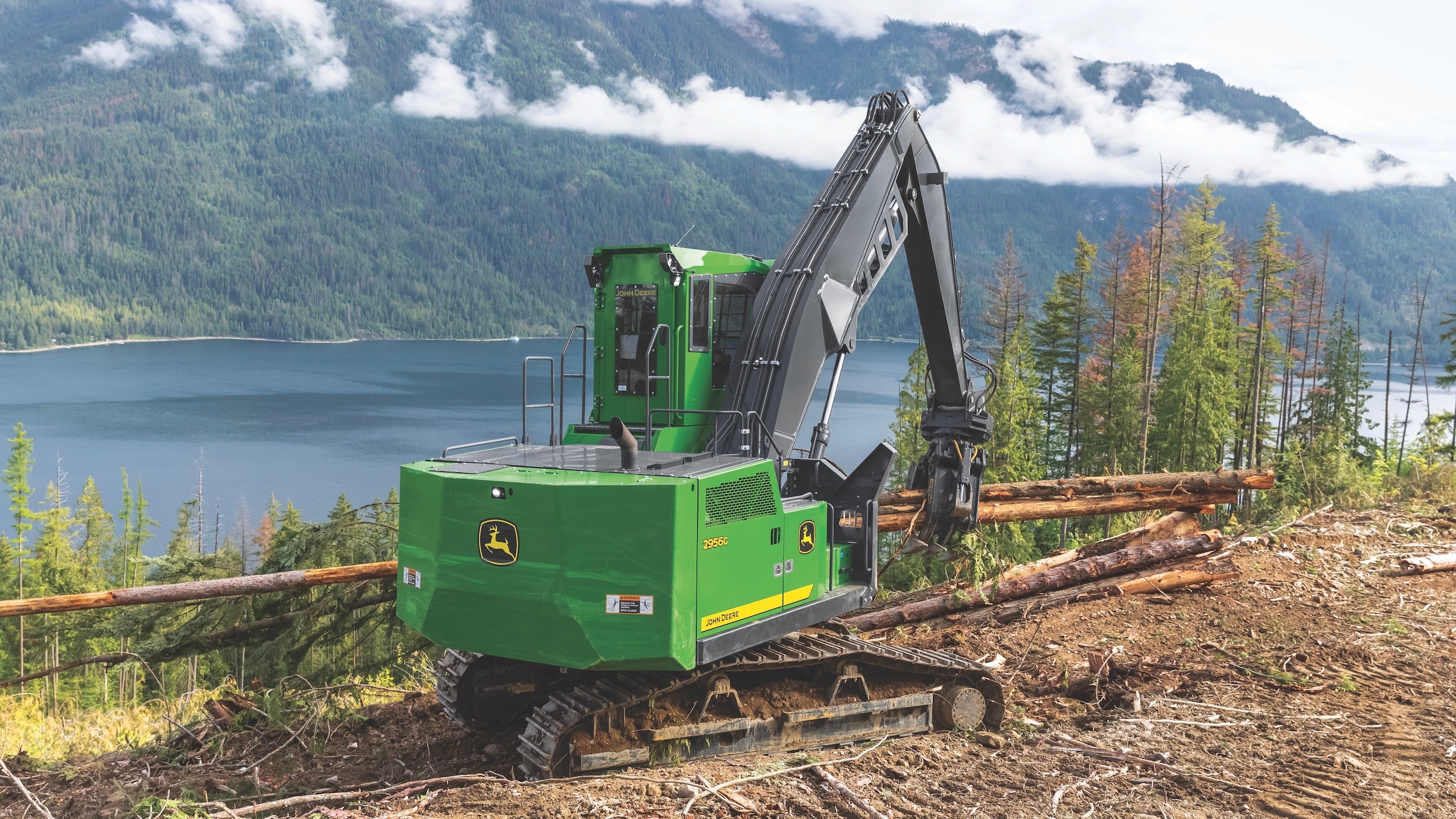 Back side and track view of the 2956G crawler log loader by the water