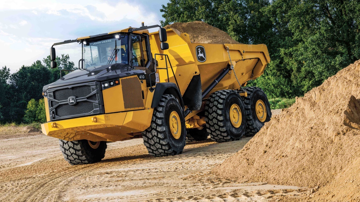 a 410 P-Tier Articulated Dump Truck hauling dirt