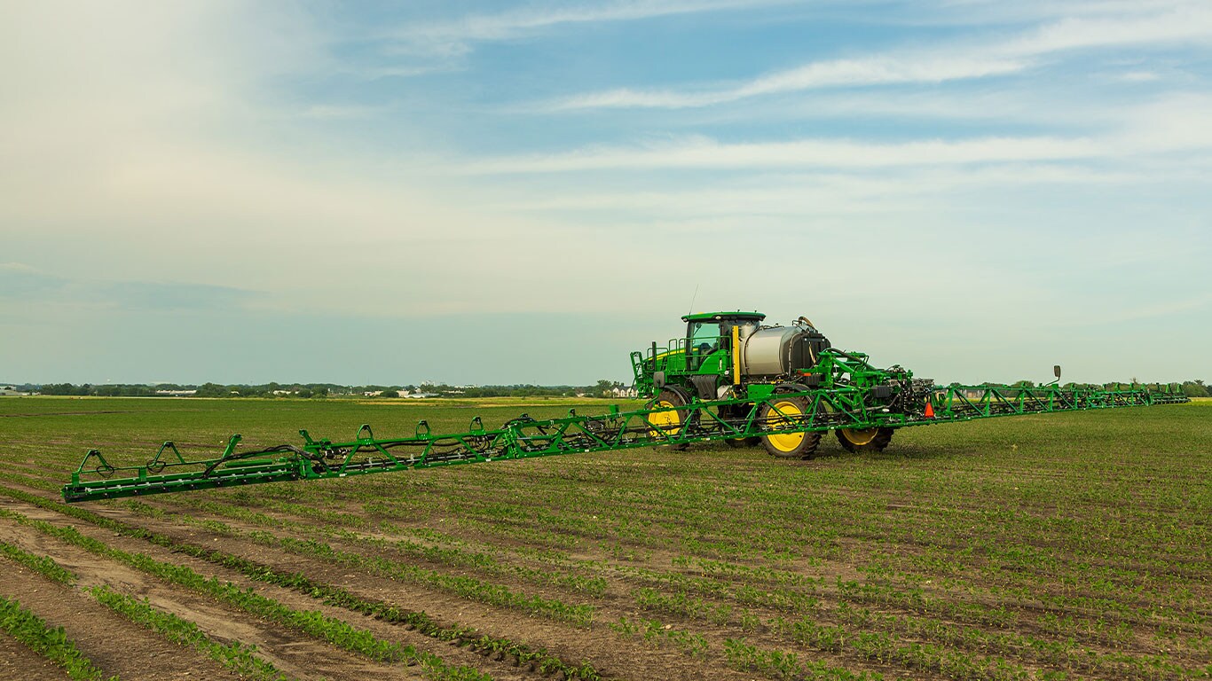 Self-propelled sprayer in the field working.