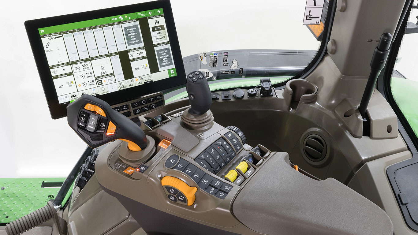 Digital display inside tractor cab.