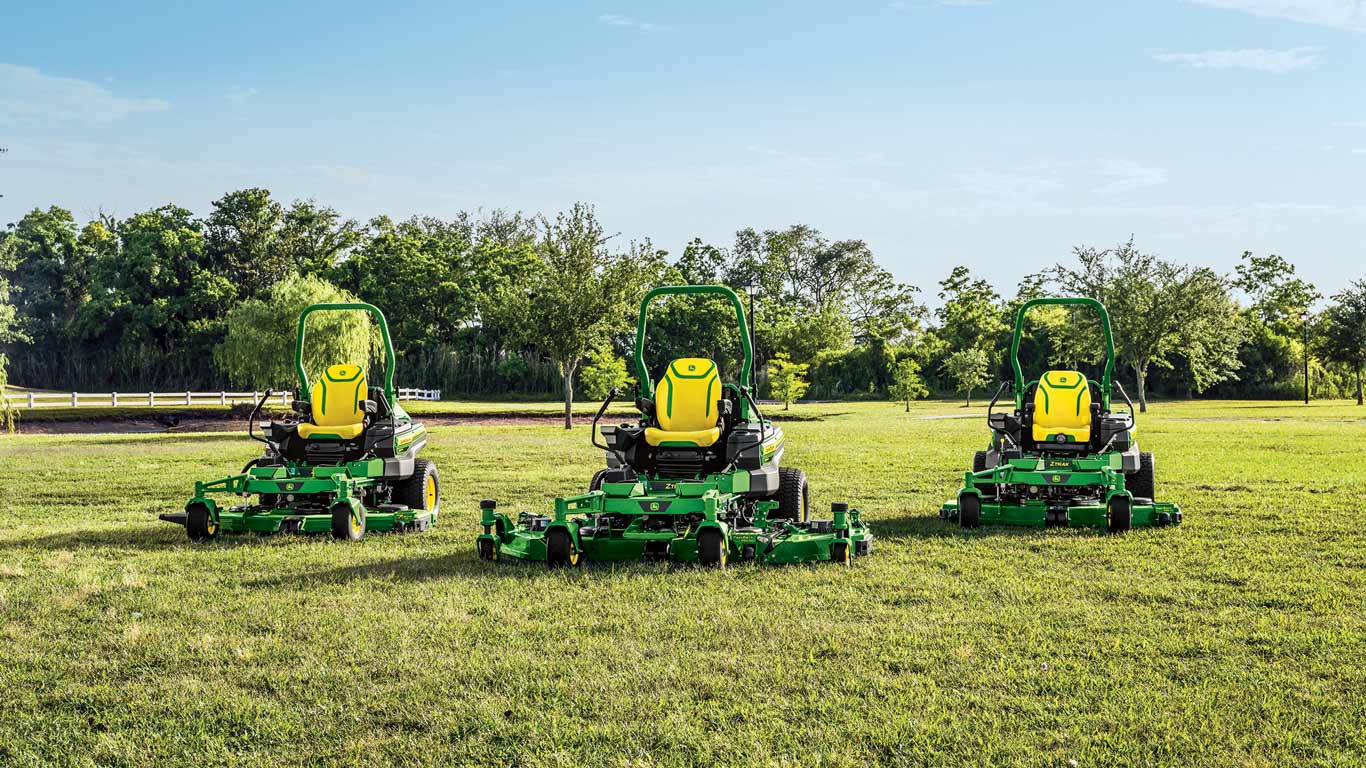 All three models of the new John Deere large diesel ZTrak Zero-Turn Mowers in the middle of a field