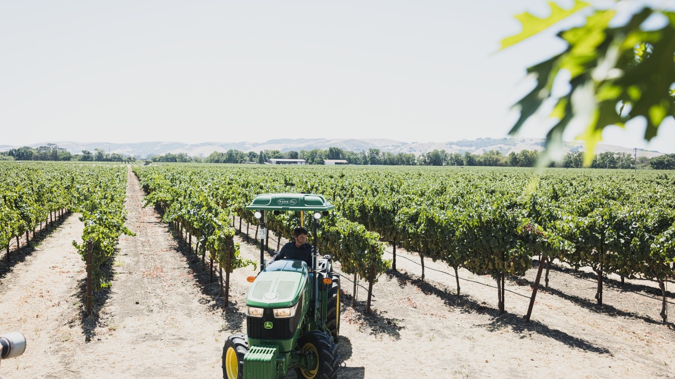 John Deere tractor with Smart Apply technology in vineyard, Sonoma County, CA