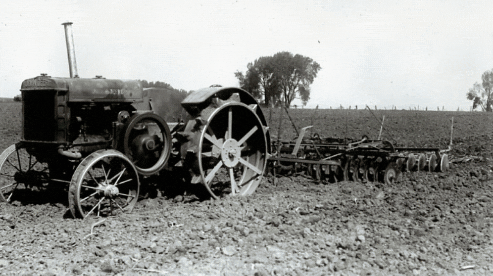 a variety of tractors from different eras show in the dynamic GIF