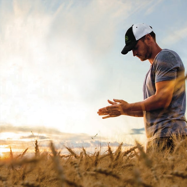 Man standing in wheat field