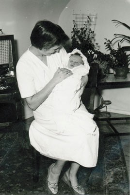 August Altherr sits with his mother.