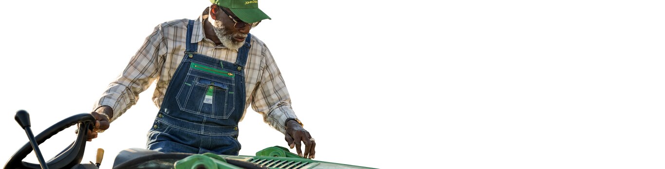 Farmer riding a tractor