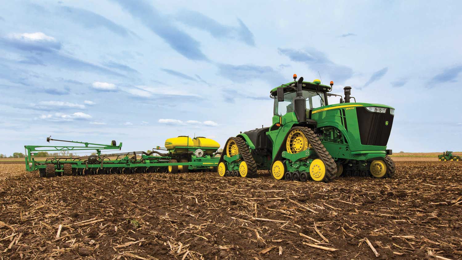 John Deere 9520RX Tractor with DB60 Planter.