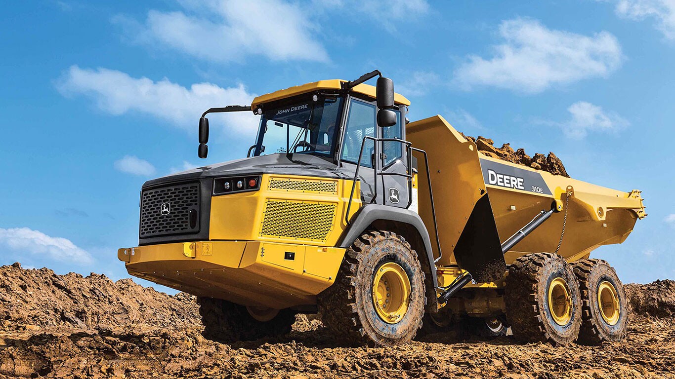 Large Image of the 310E machine on a construction jobsite.