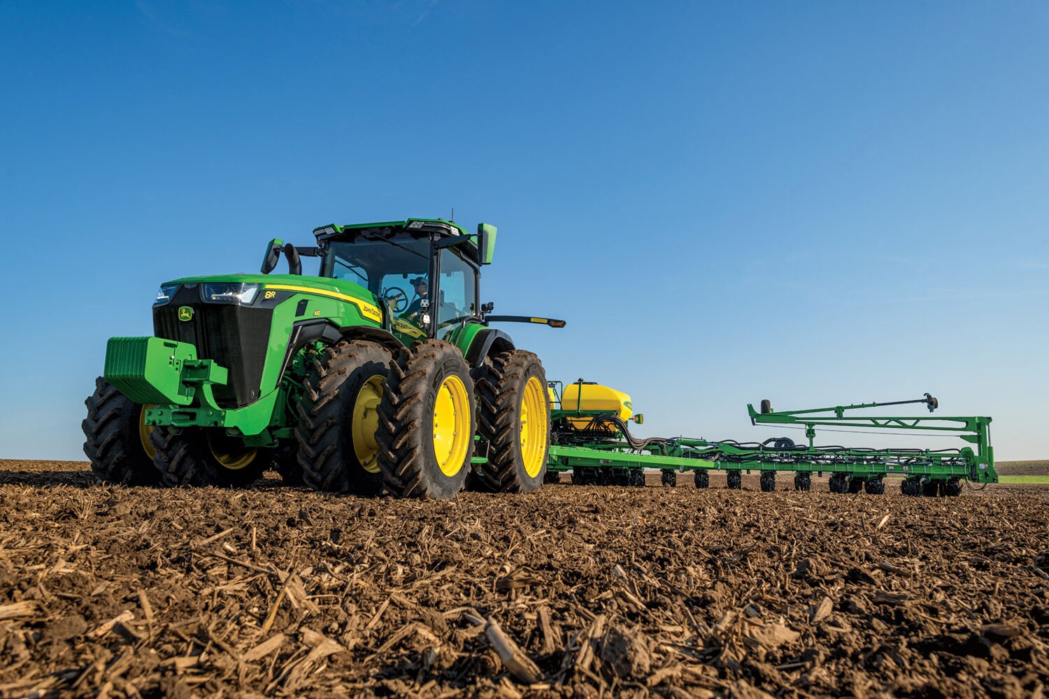 Deere introduces the 8RX Tractor, the industry's first fixed