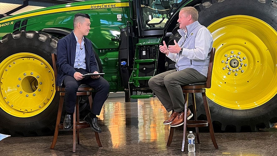 John Deere CEO John May getting interviewed by a tech influencer