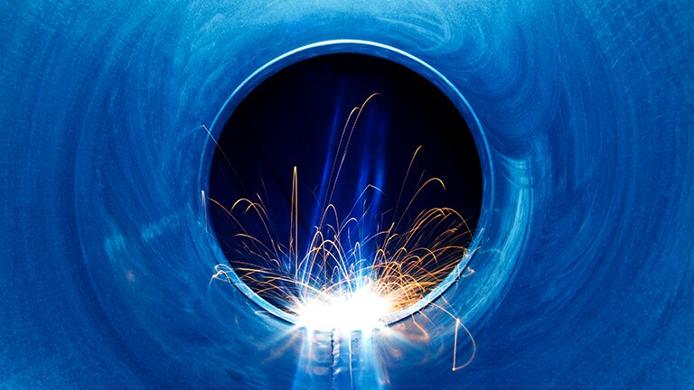 A blue circle with sparks