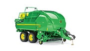 Studio image of a square baler on a white background.