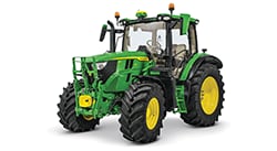 Green John Deere 6M/6R utility tractor with enclosed cab and agricultural tires displayed on a white background.