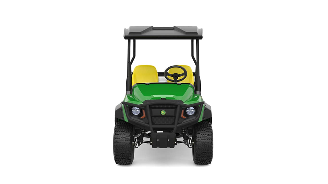 A green Gator with two yellow seats and large cargo box facing forward on a white background.