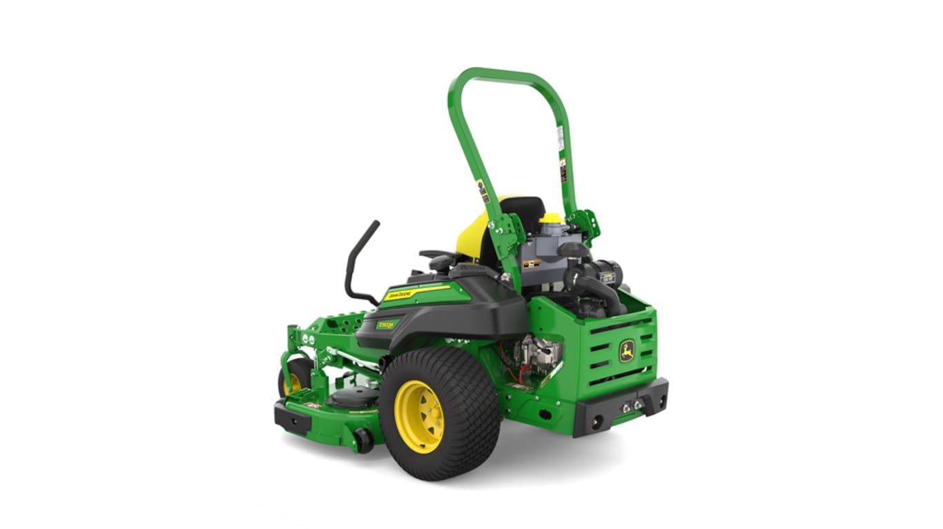 Rear-left view of a green riding lawn mower with a yellow seat, black wheels, and various controls.