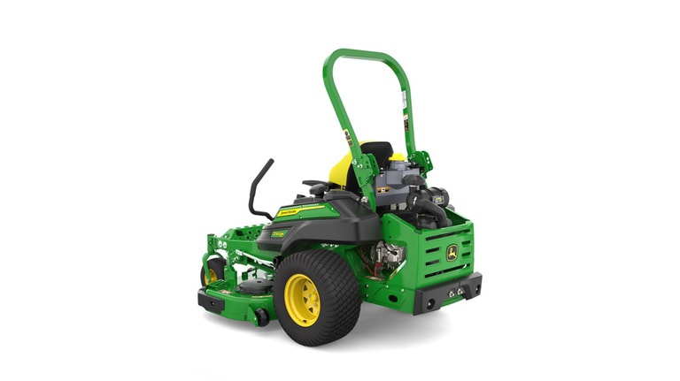 Rear-left view of a green riding lawn mower with a yellow seat, black wheels, and various controls.