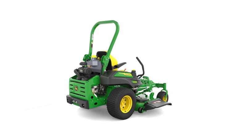 Rear-right view of a green riding lawn mower with a yellow seat, black wheels, and various controls.