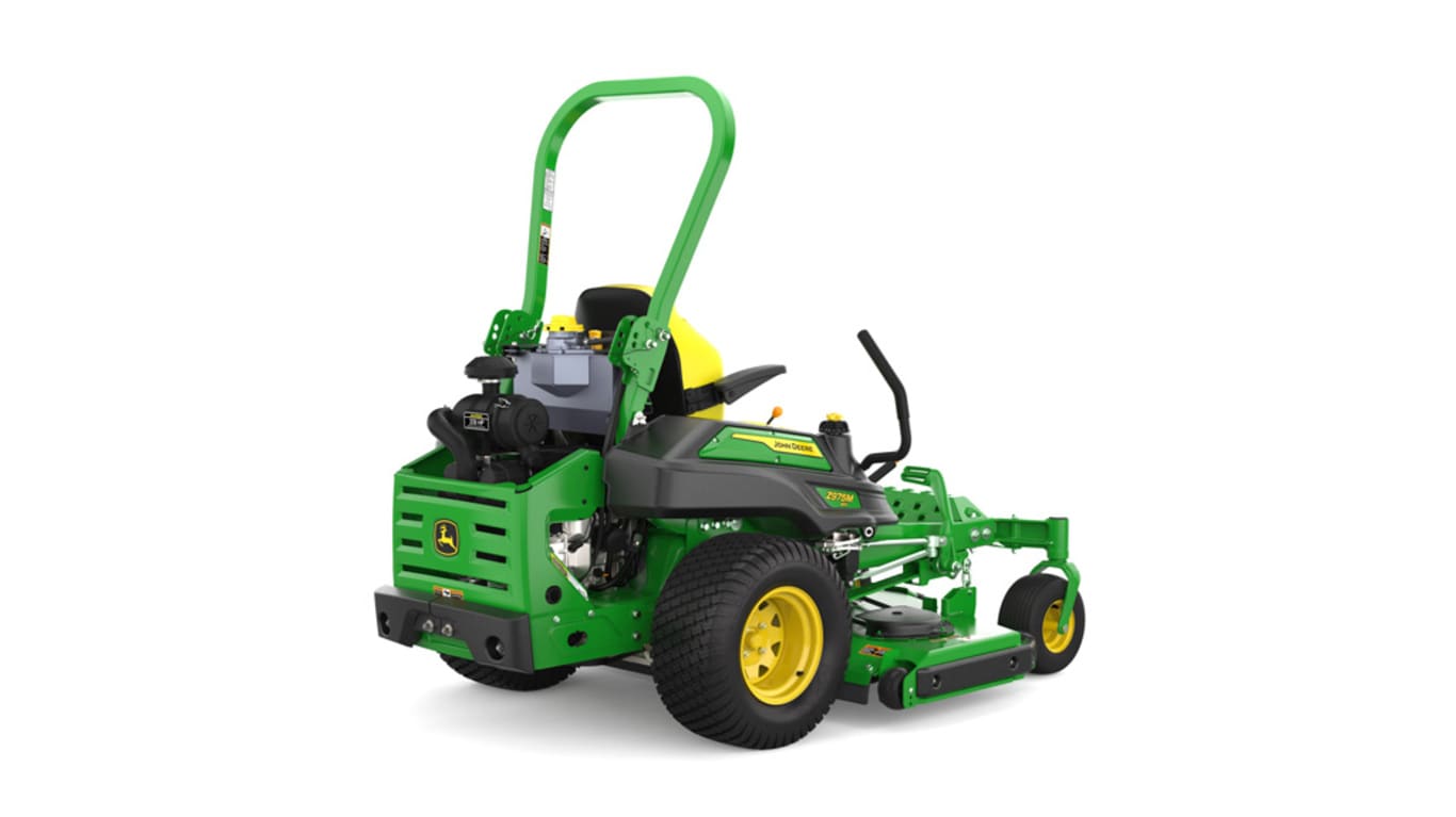 Rear-right view of a green riding lawn mower with a yellow seat, black wheels, and various controls.