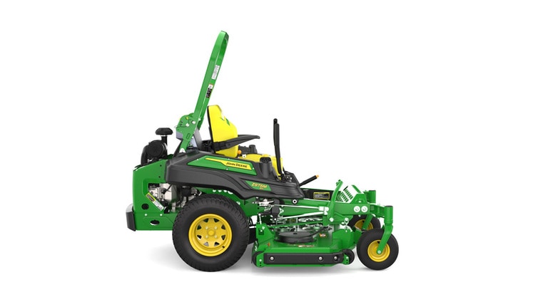 Right-side view of a green riding lawn mower with a yellow seat, black wheels, and various controls.