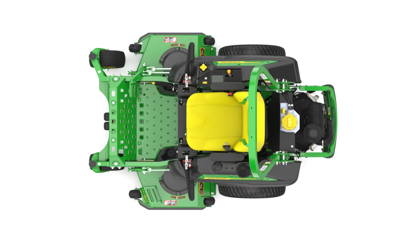Top view of a green riding lawn mower with a yellow seat, black wheels, and various controls.