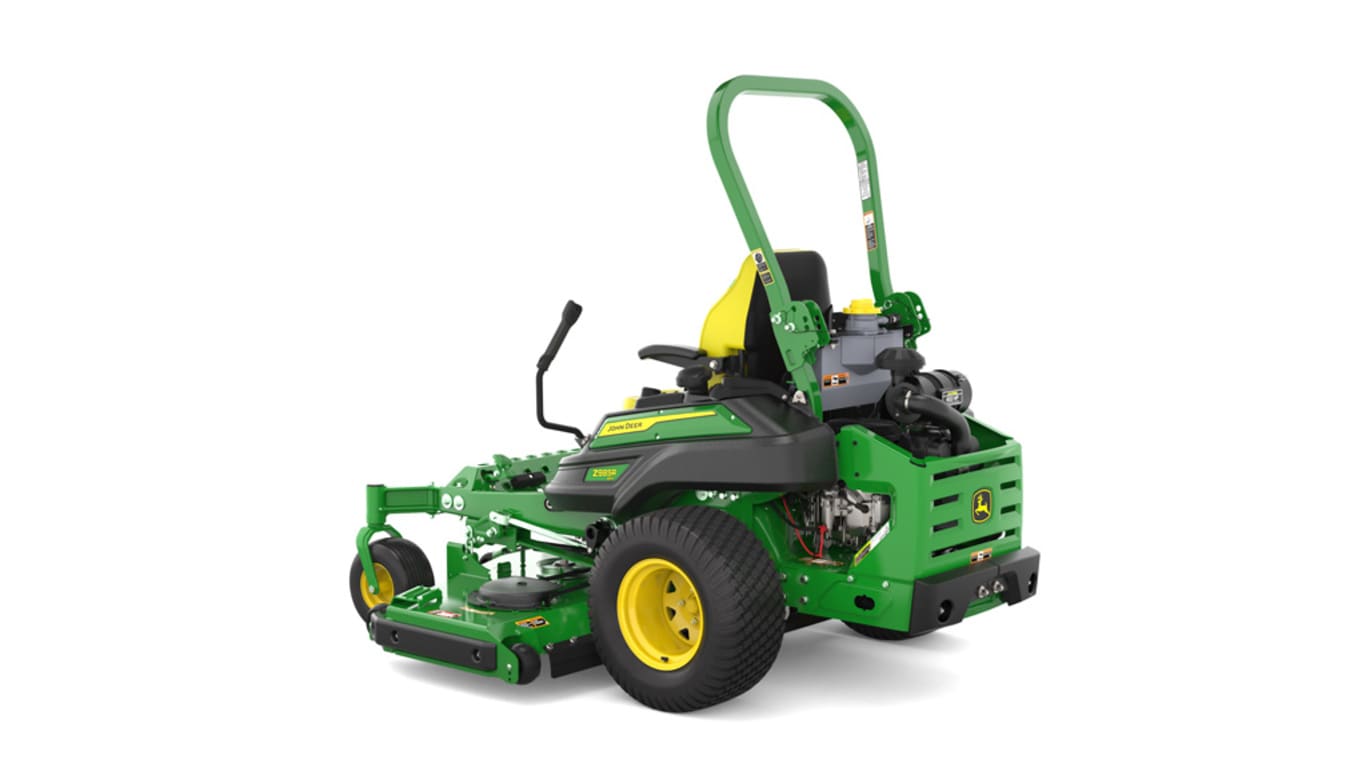 Rear-left view of a green and yellow riding mower with roll bar, large rear wheels, and various controls