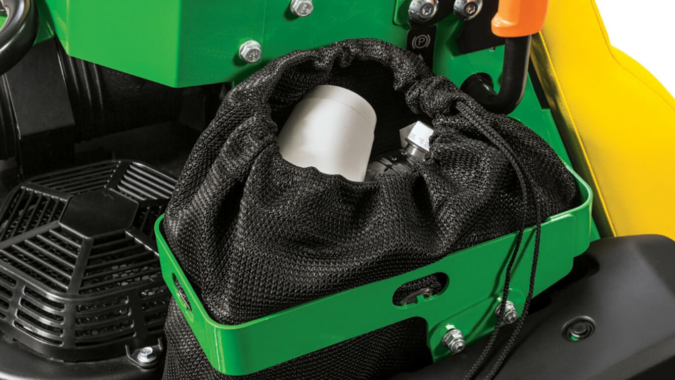 Close up of the Q820M QuikTrak Stand-on mowers trash bag holder