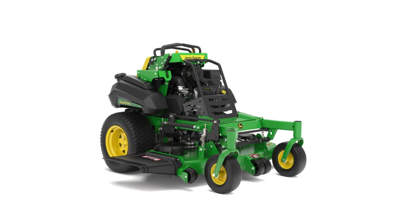A front-right-facing studio shot of a green and yellow standing mower on a white background.