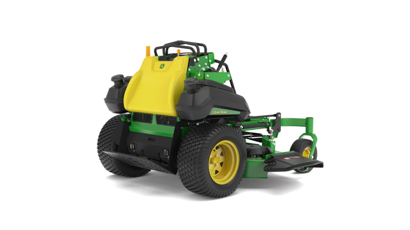 A rear-right-facing studio shot of a green and yellow standing mower on a white background.