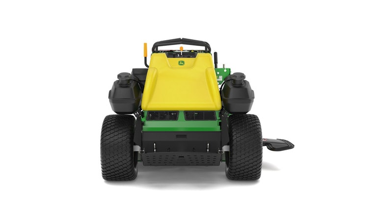 A rear-facing studio shot of a green and yellow standing mower on a white background.