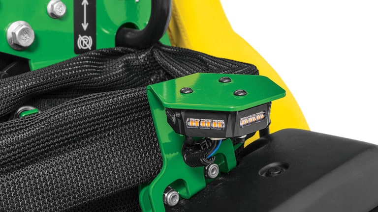 Close up beacon light hazards flasher kit on the Q820M QuikTrak Stand-on mower