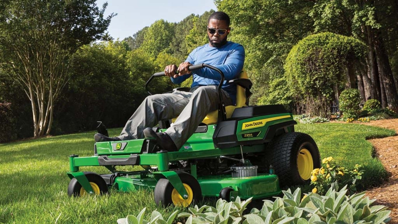 Person cutting grass using a Z370R Electric Ztrak