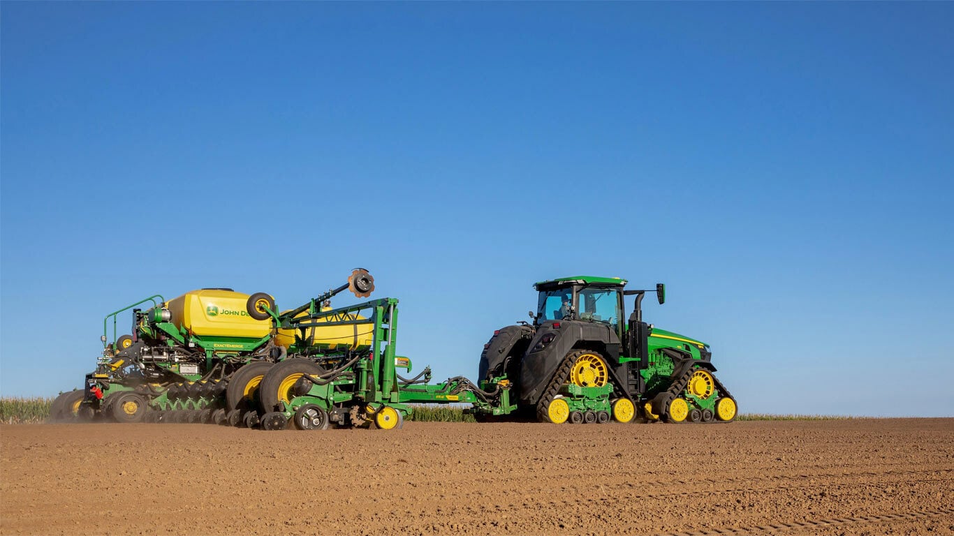 1775NT 24Row30 Drawn Planter working in a field.