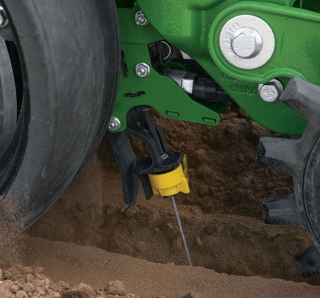 ExactShot&trade; delivers an exact dose of fertilizer in-furrow on a 1775NT 24Row30 drawn planter in-field