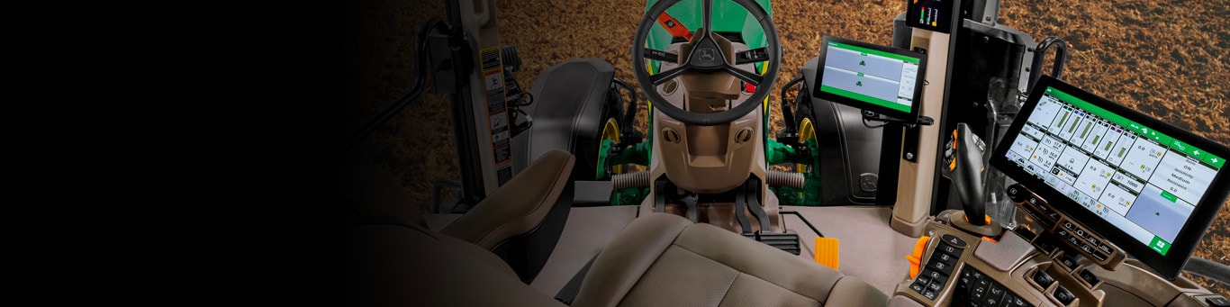 Photo du tracteur dans la cabine montrant la nouvelle console CommandCenter G5Plus