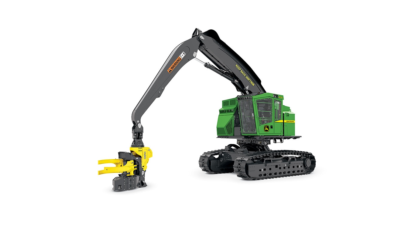 John Deere tracked forestry machine with processing head and hydraulic boom