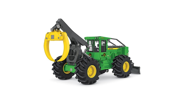 Machine forestière verte et jaune avec de gros pneus et un accessoire de pince à l’avant.