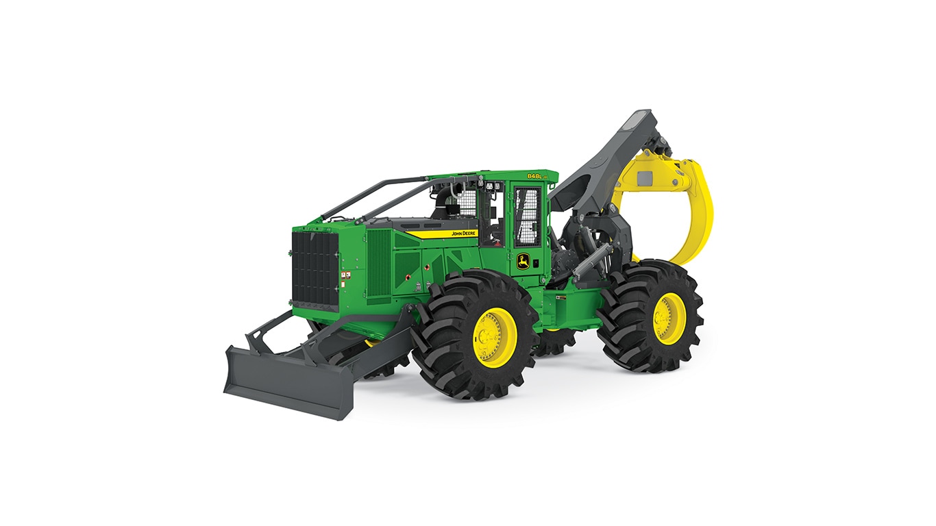 Machine forestière verte et jaune avec de gros pneus et un accessoire de pince à l’avant.