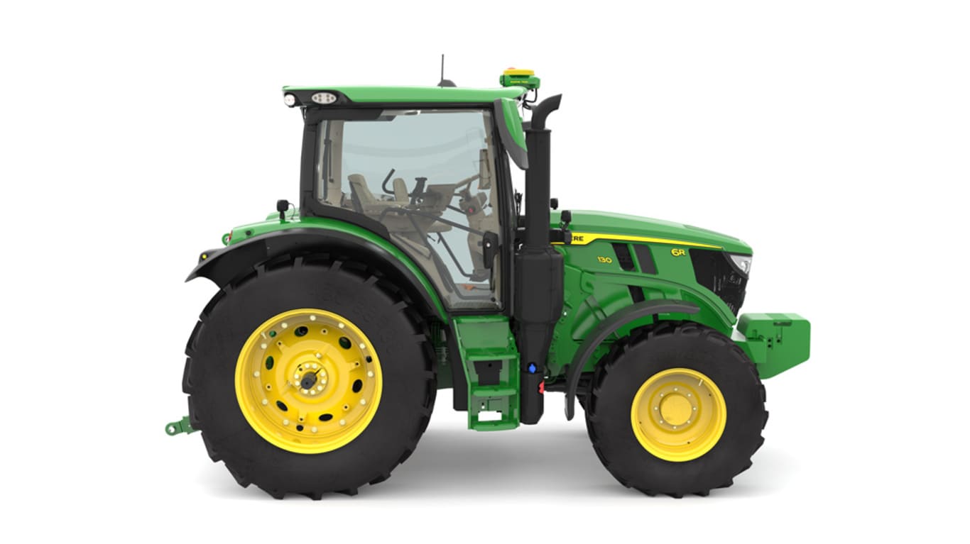 Studio image of the right side view of a green 6R 130 Utility Tractor.