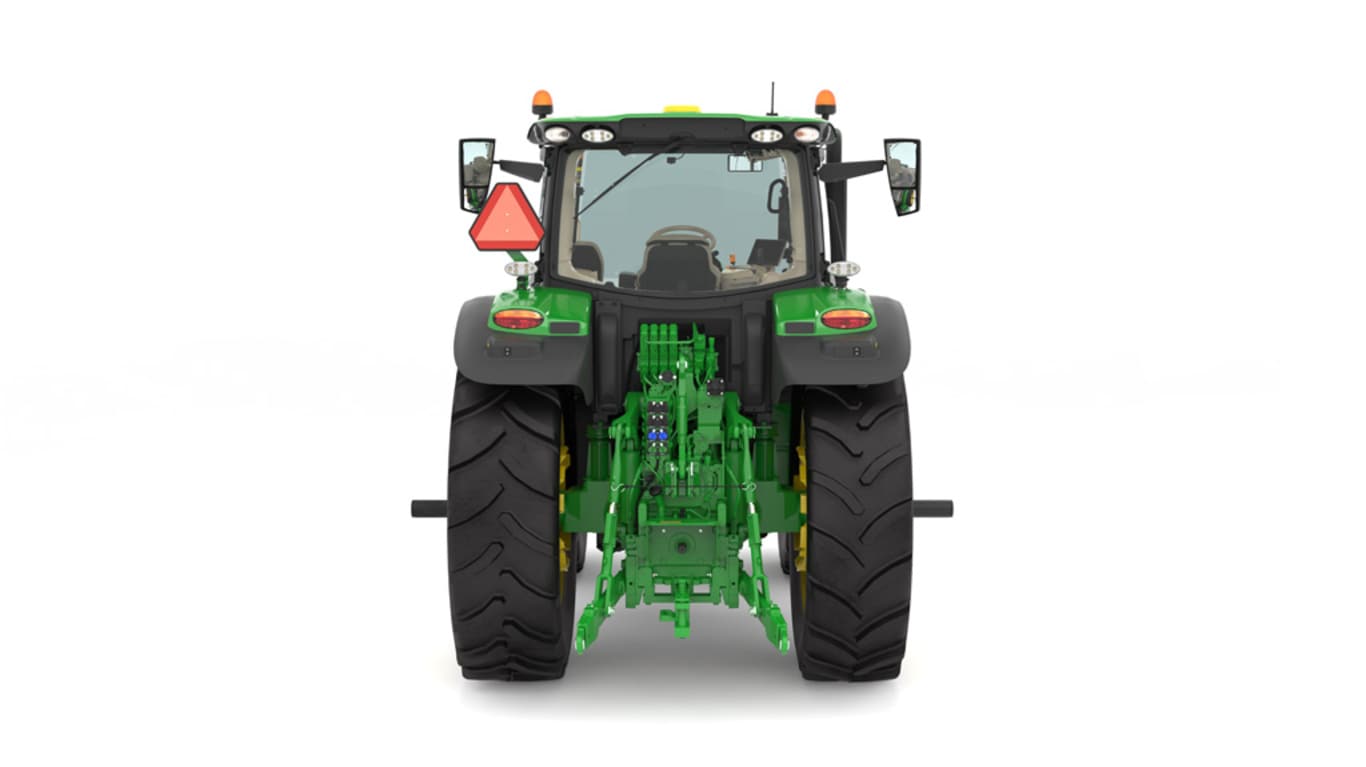 Studio image of the rear side view of a green 6R 215 Row Crop Tractor.