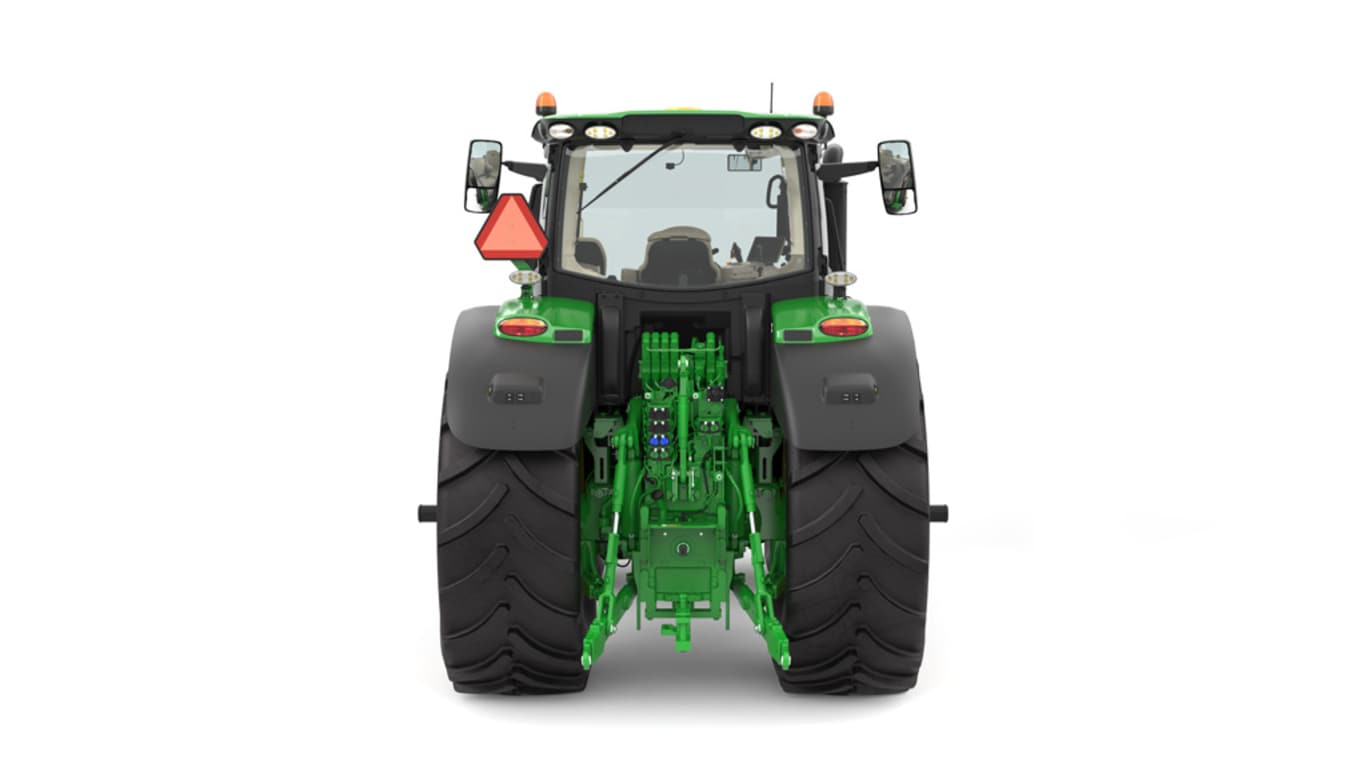 Studio image of the rear side view of a green 6R 230 Utility Tractor.