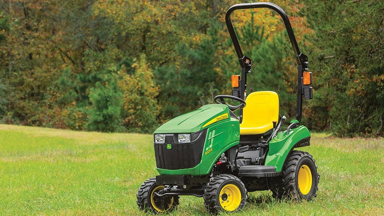 1023E Compact Tractor in field